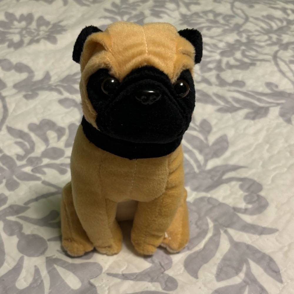 Stuffed pug with Velcro pouch